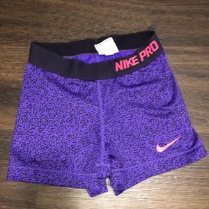 Purple animal print Nike Pros